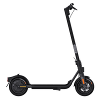 A black Ninebot F2 Kick-Scooter by Segway with its kickstand extended and visible rear-wheel drive system.